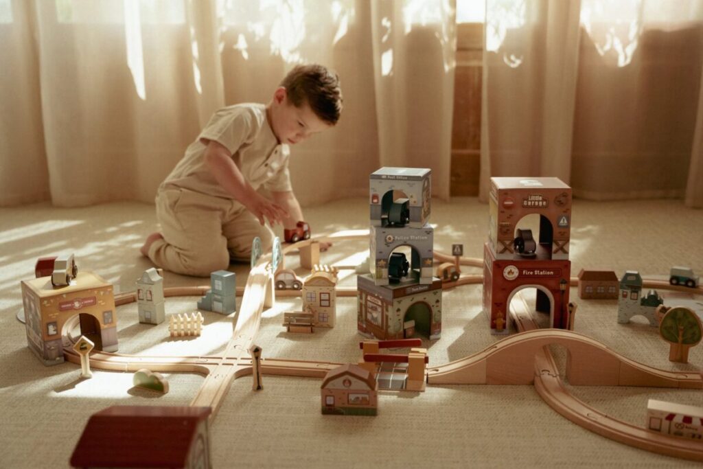 Little Dutch kartona klucīšu komplekts ar auto – krāsaina rotaļlieta bērniem, kas attīsta radošumu un loģisko domāšanu.