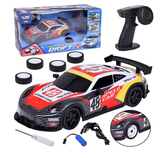 Radiovadāmā drifta mašīna ar LED gaismām un rezerves riepām, rotaļlieta bērniem auto sacīkstēm